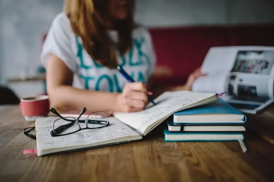 Business owner planning in a notebook